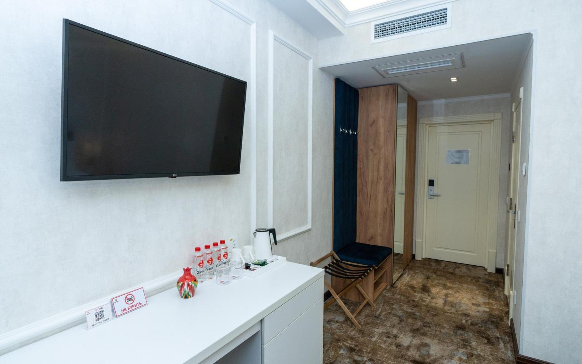 Garnet Mir Hotel Ташкент Стая снимка